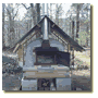 Very nice backyard and the brick wood oven.