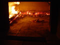 Picture of ash and red hot ambers in the dome from four firings.