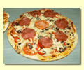 This pizza is ready to be fired.