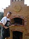 Swishy wood fired brick oven in Bonny Hills built by Manfred.