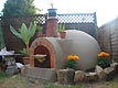 Garden with a low-set round pleasure dome object.