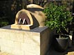 Round wood burning pizza oven built in Perth.